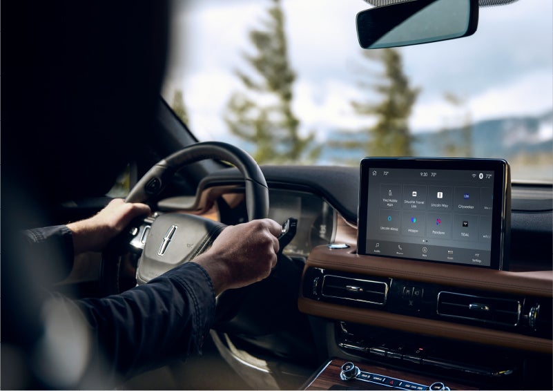 The Lincoln+Alexa app screen is displayed in the center screen of a 2023 Lincoln Aviator® Grand Touring SUV | Crest Lincoln in Sterling Heights MI