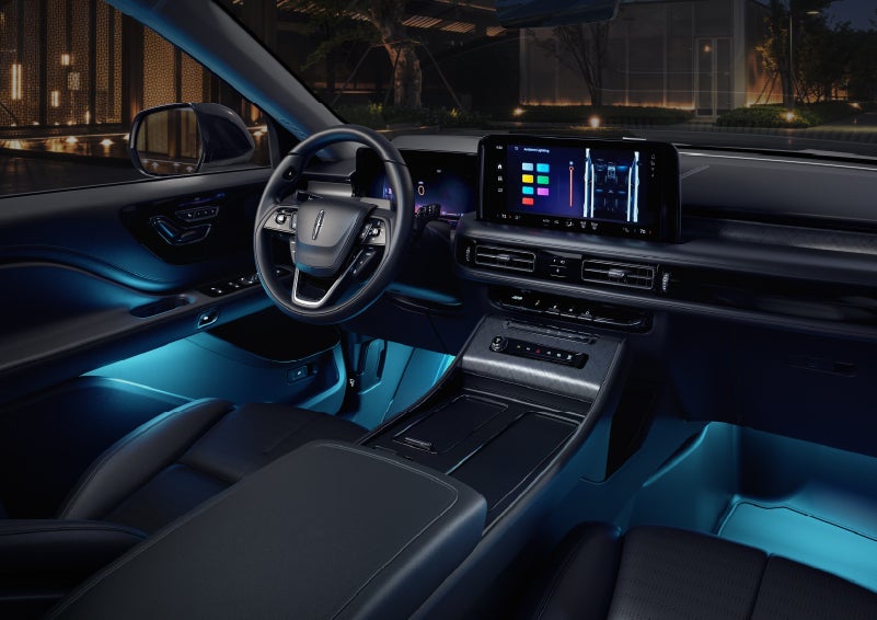 Deep blue ambient lighting glows from various places within a 2026 Lincoln Aviator® SUV. | Crest Lincoln in Sterling Heights MI