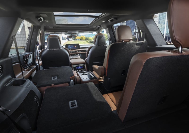 One side of the PowerFold® third-row seat and a second-row seat are folded forward in the 2026 Lincoln Aviator® SUV. | Crest Lincoln in Sterling Heights MI
