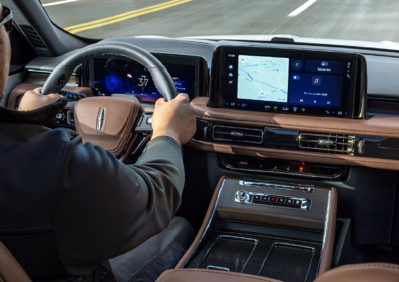 A person is driving a 2026 Lincoln Aviator® SUV as seen from inside the cabin. | Crest Lincoln in Sterling Heights MI