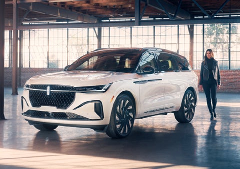 A person approaches a 2026 Lincoln Nautilus® SUV. | Crest Lincoln in Sterling Heights MI