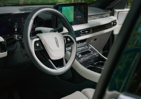 The leather-trimmed steering wheel of a 2027 Lincoln Aviator® Black Label™ SUV. | Crest Lincoln in Sterling Heights MI