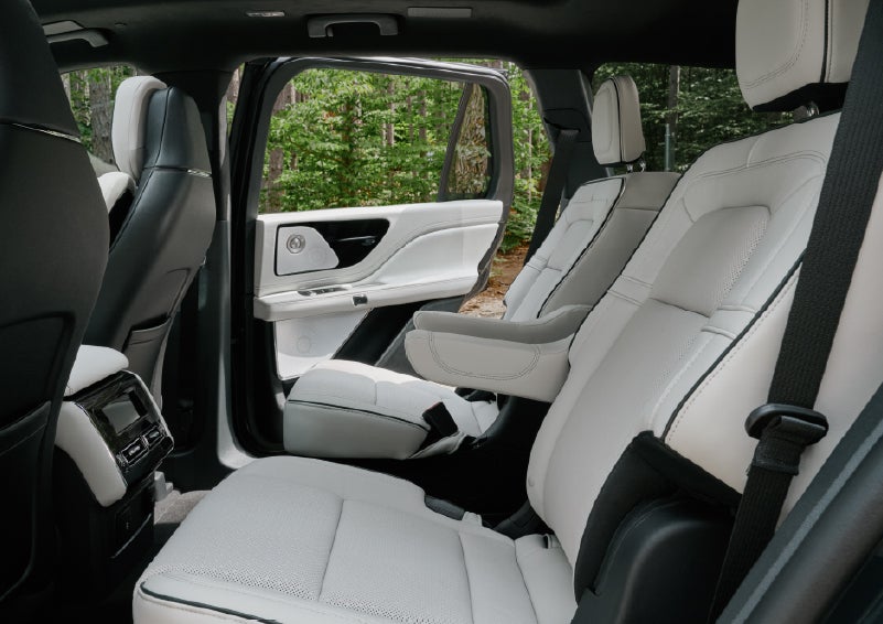 A side view of the second row with captain’s chairs in a 2027 Lincoln Aviator® Black Label™ SUV. | Crest Lincoln in Sterling Heights MI