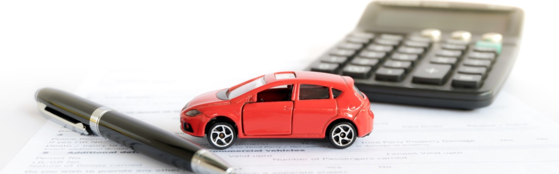 A technician is walking towards a black Lincoln Mobile Service van.